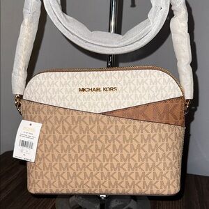 Michael Kors  $398 Tan and White Crossbody Bag